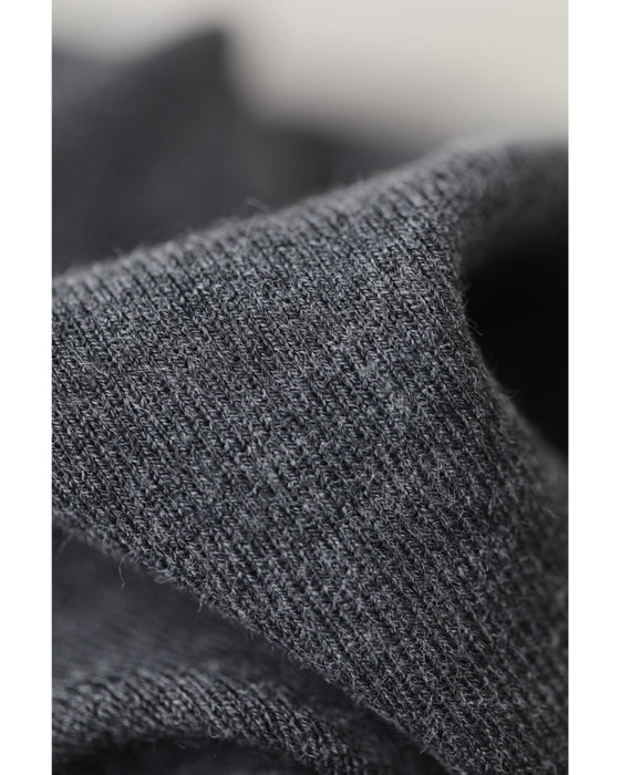 ゆったりスリーブの短丈ニットプルオーバートップス