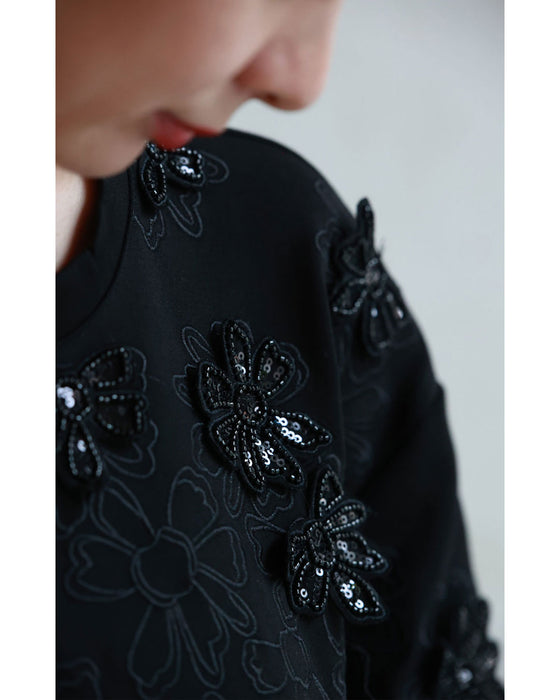 Sequined sparkling black floral applique pullover top