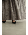 A tucked long skirt with nuanced art