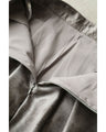 A tucked long skirt with nuanced art