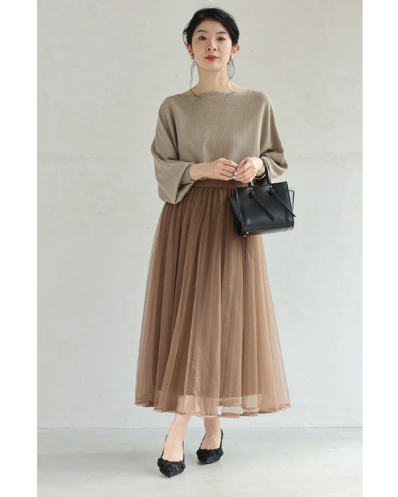 黒花コサージュのヒールパンプス