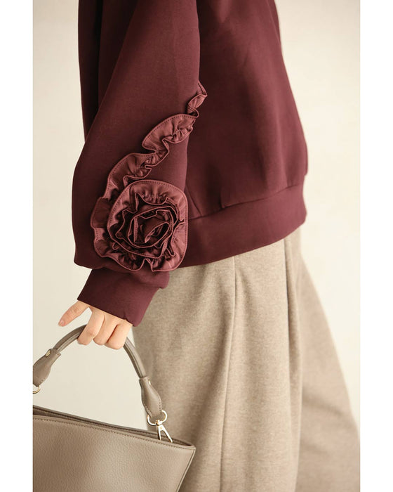 うずまきフリルの花咲くプルオーバートップス