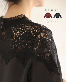  Glossy pullover top with décolleté lace and sparkling stones