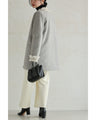 A pearl button coat with sparkling beaded daisy frills