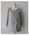 A pearl button coat with sparkling beaded daisy frills