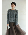 Knitted pullover top with appliqued flowers
