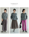 Knitted pullover top with appliqued flowers