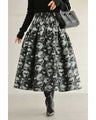 A jacquard midi skirt with a modern floral world