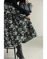 A jacquard midi skirt with a modern floral world