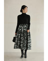 A jacquard midi skirt with a modern floral world
