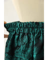 Emerald flower jacquard tuck midi skirt