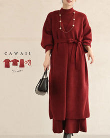  A chic red 4-piece set consisting of a top, skirt and belted cardigan.