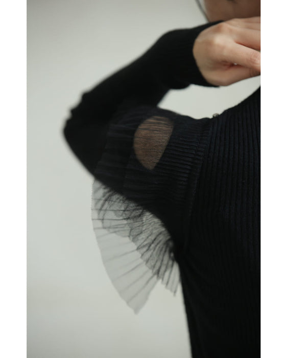 Ribbed knit cut-and-sew top with overlapping tulle ruffles and jewels