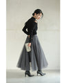 Ribbed knit cut-and-sew top with overlapping tulle ruffles and jewels