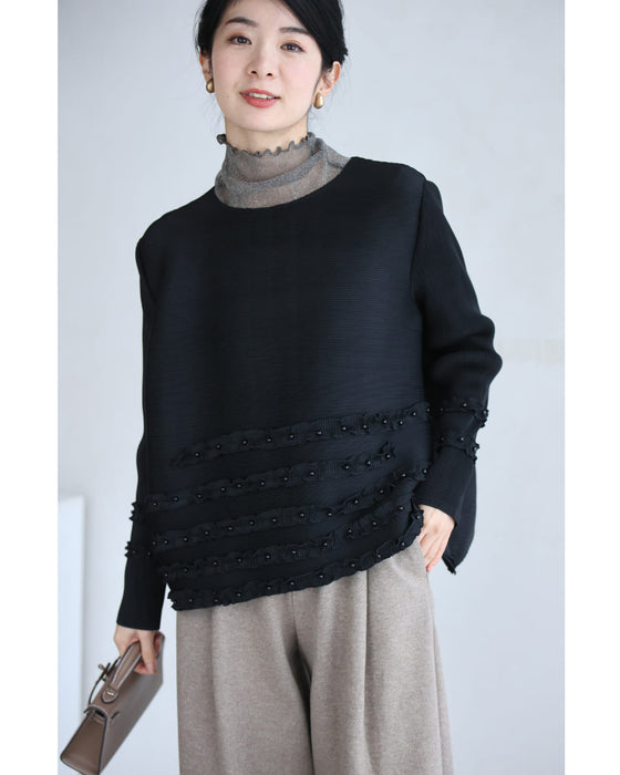 パールを飾ったフリルラインのプリーツカットソートップス