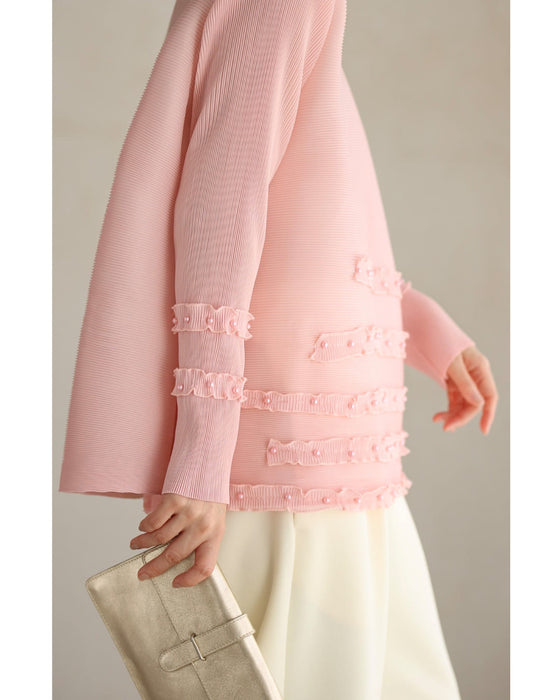 パールを飾ったフリルラインのプリーツカットソートップス