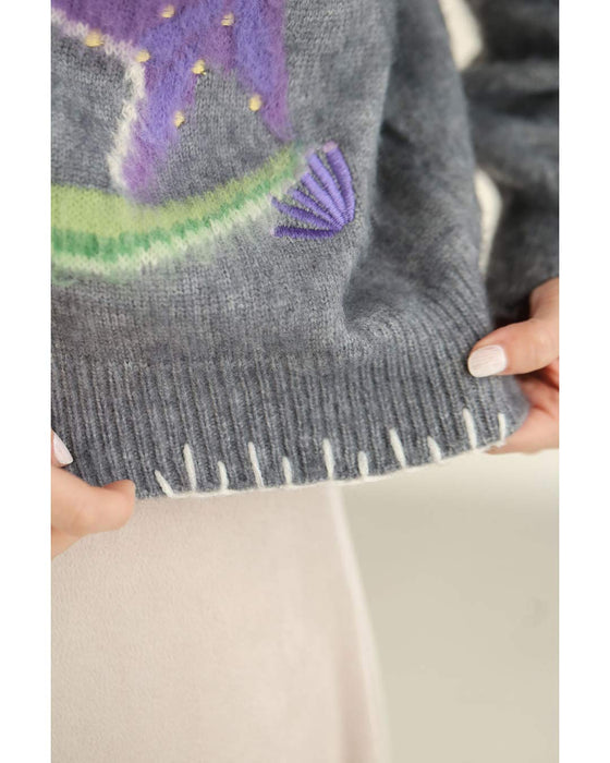 ふんわり浮かび上がる植物モチーフのニットカーディガン