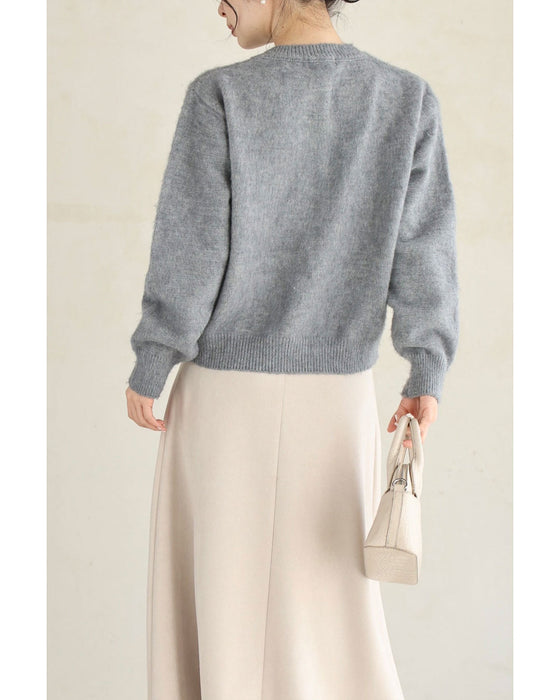 ふんわり浮かび上がる植物モチーフのニットカーディガン