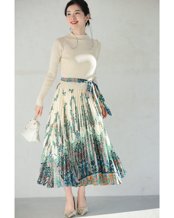 オリエンタルな柄が広がるドッキングプリーツミディアムワンピース(リボン付き)