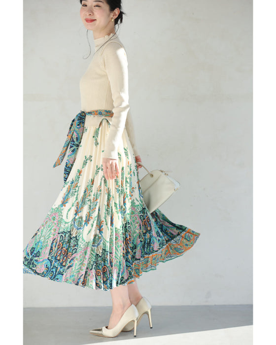 オリエンタルな柄が広がるドッキングプリーツミディアムワンピース(リボン付き)