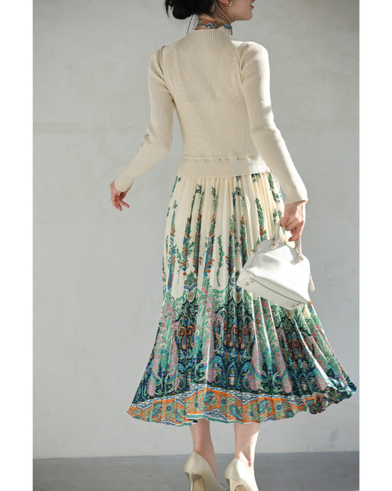 オリエンタルな柄が広がるドッキングプリーツミディアムワンピース(リボン付き)