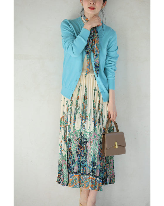 オリエンタルな柄が広がるドッキングプリーツミディアムワンピース(リボン付き)
