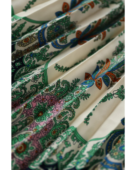 オリエンタルな柄が広がるドッキングプリーツミディアムワンピース(リボン付き)