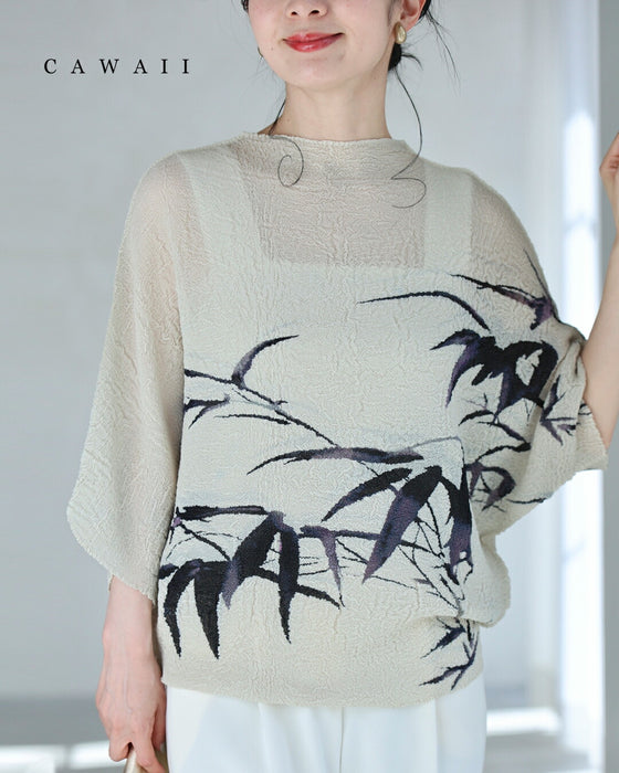 風に揺れるリーフ柄の伸びやかくしゅくしゅカットソートップス