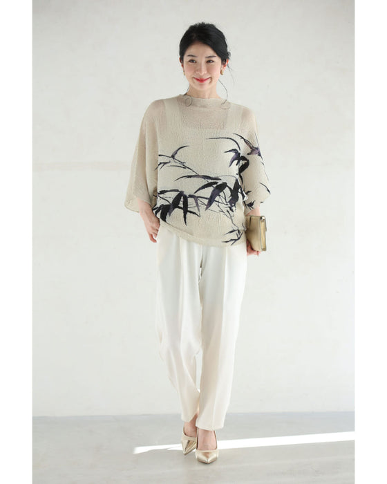 風に揺れるリーフ柄の伸びやかくしゅくしゅカットソートップス