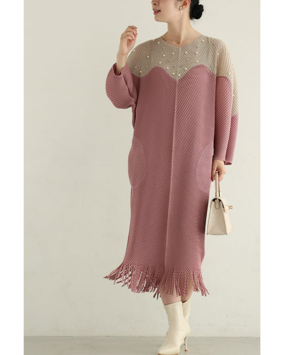 裾に揺れるフリンジの波うつバイカラーミディアムワンピース