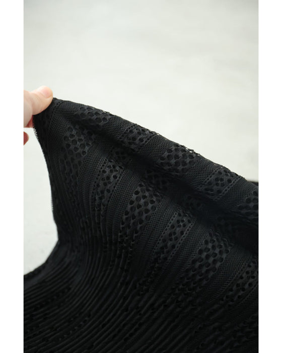 模様が浮かぶフリンジ裾Iラインミディアムスカート