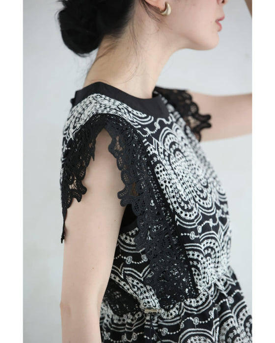 美しい装飾刺繍のペプラムカットソートップス