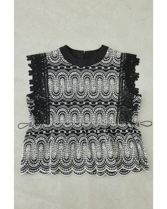 美しい装飾刺繍のペプラムカットソートップス