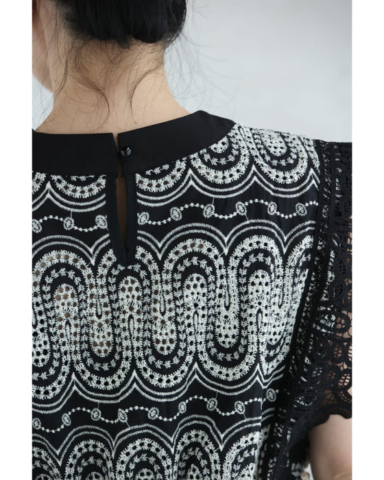 美しい装飾刺繍のペプラムカットソートップス