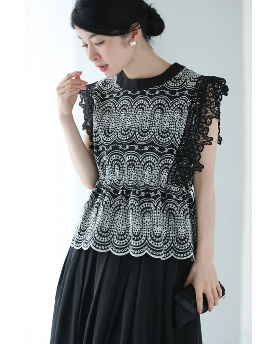 美しい装飾刺繍のペプラムカットソートップス