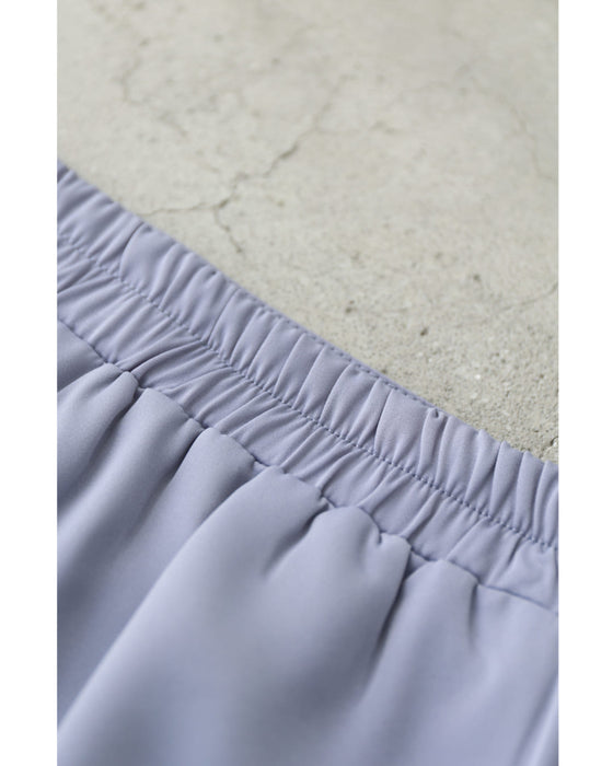 ふんわり広がるギザギザチュールの艶めきミディアムスカート