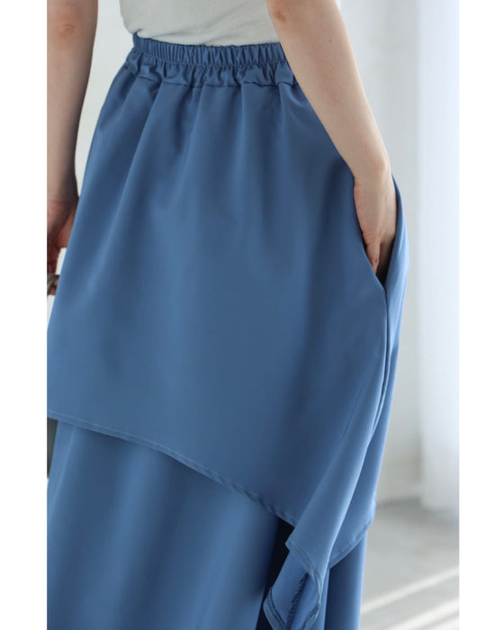 重なるレイヤードデザインミディアムスカート