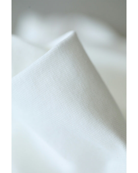 ひと匙のエレガントをプラスする裾チュールのTシャツトップス