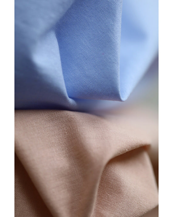 パステルカラーのネックタイカットソートップス