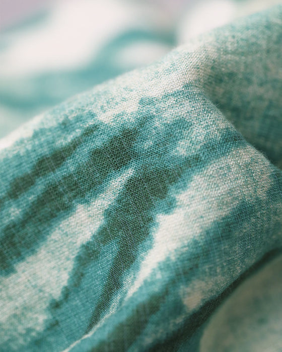 さらり心地よい南国リーフ柄コクーンシルエットワンピース(リボン付き)