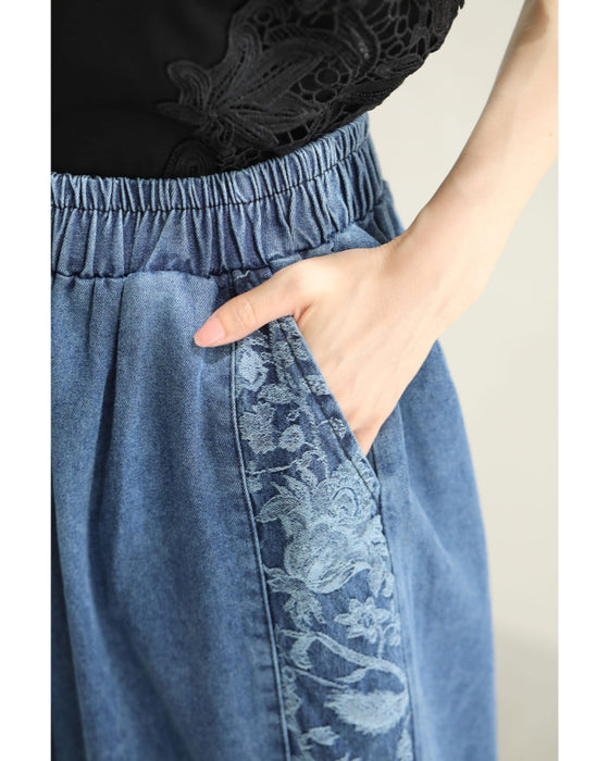 花の絵流れるサイドラインのゆったりワイドパンツ