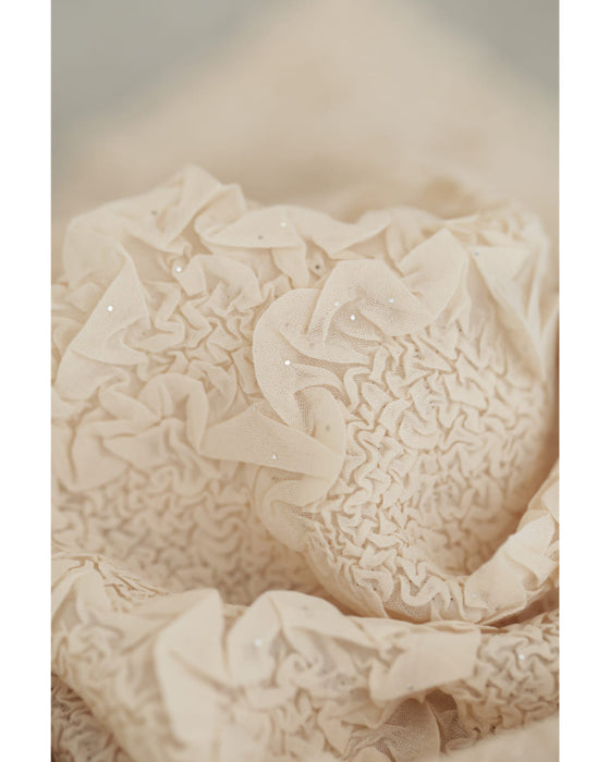 ささやかに煌めく立体シアーカットソートップス