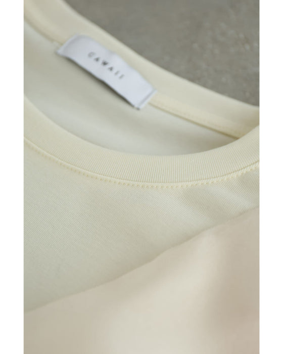 縁取りビジューのアシンメトリーフリルTシャツトップス