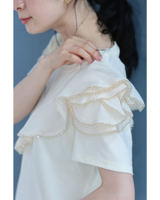 縁取りビジューのアシンメトリーフリルTシャツトップス