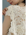 着飾るパールの花レースカットソートップス