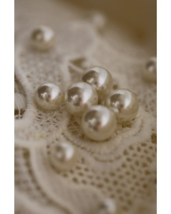 着飾るパールの花レースカットソートップス