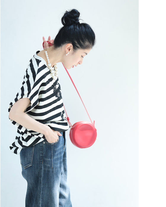 腕周りゆったりドルマンの黒花刺繍ボーダーTシャツトップス