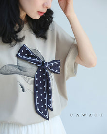  麦わら帽子のドットリボンがなびくドルマンTシャツトップス
