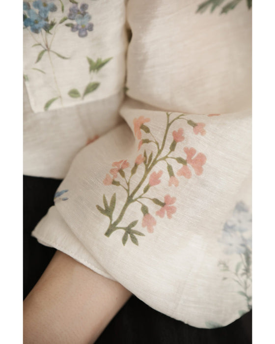 肌触り柔らかな花集めシアーシャツトップス