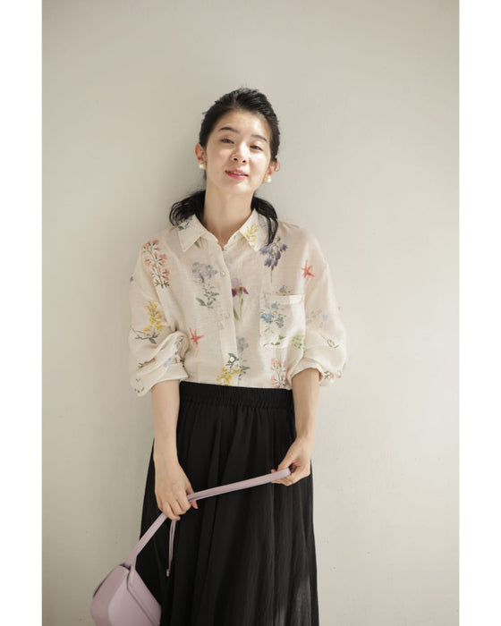 肌触り柔らかな花集めシアーシャツトップス